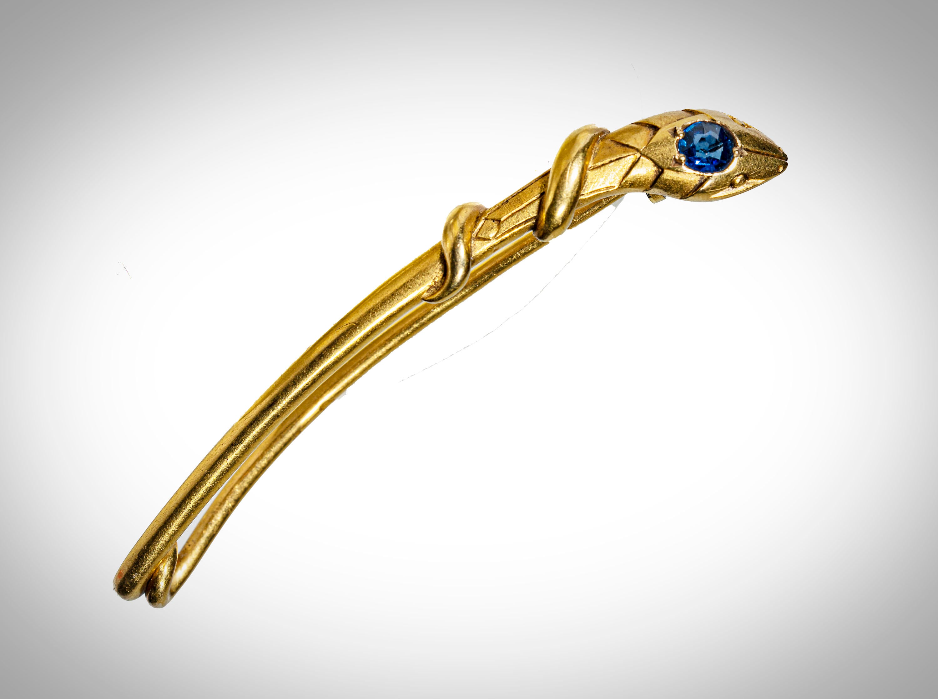 18k French snake with blue sapphire brooch