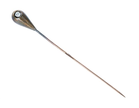 Arts & Crafts 14k stick pin with 2 mm natural diamond