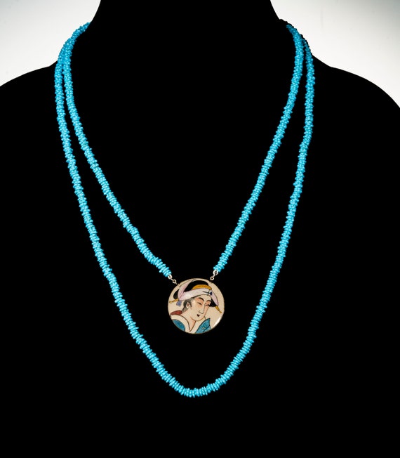 Satsuma button pendant on blue glass beaded neckla