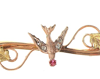 10k Victorian flying bird pin brooch with ruby and diamond paste stones