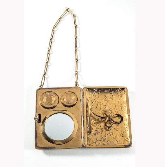 Art Deco embossed brass vanity compact on chain - image 1