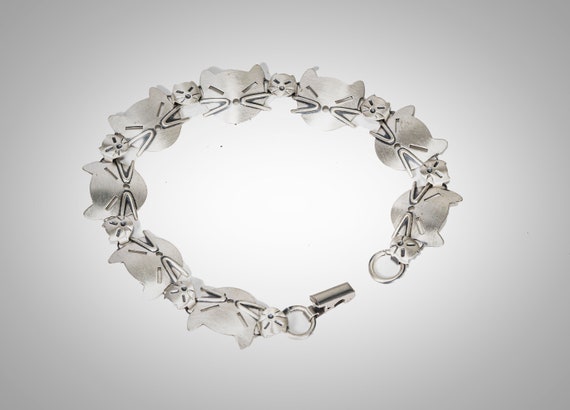 Beau sterling cat faces bracelet