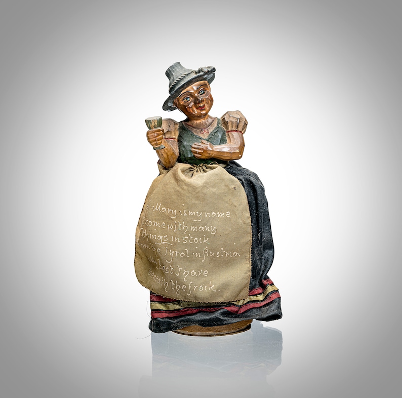 Austrian woman figural candy container