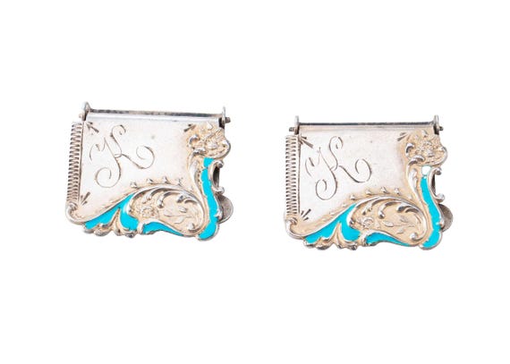 antique. enamel sterling silver suspender clips