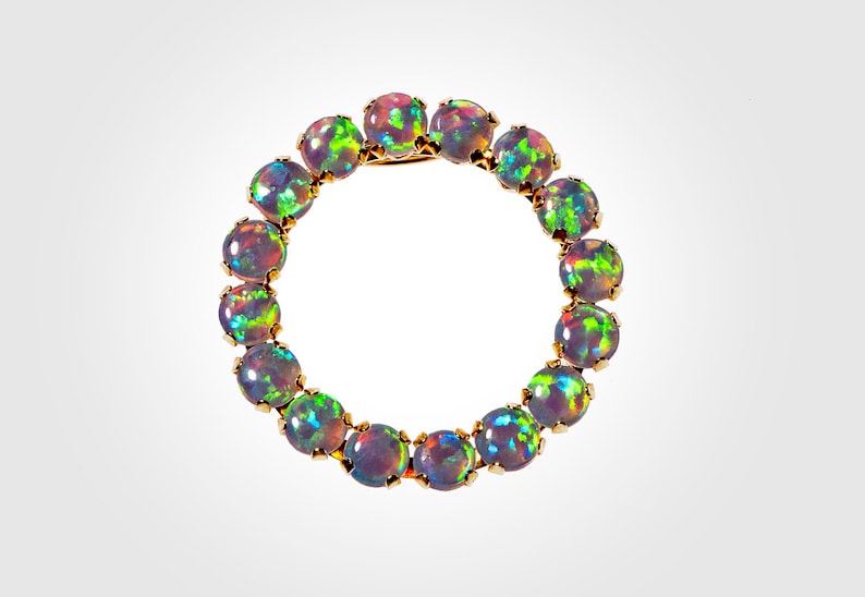 10k opals circle pendant