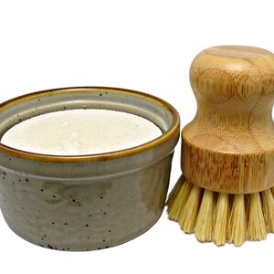 solid dish washing soap in ceramic ramekin.  Includes washing brush.  zero waste and eco-friendly.