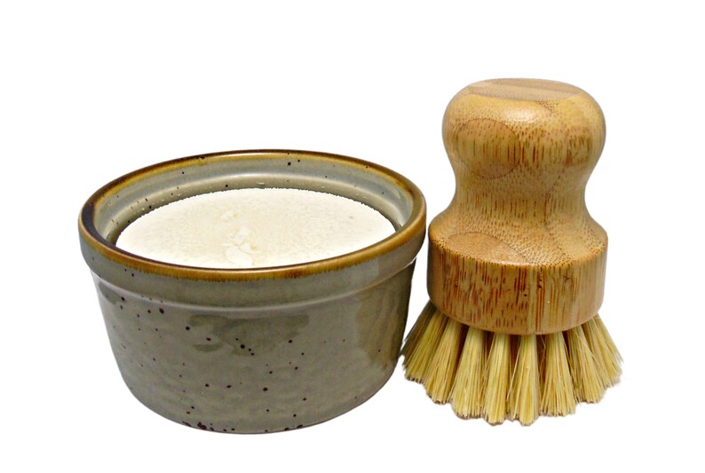 solid dish washing soap in ceramic ramekin.  Includes washing brush.  zero waste and eco-friendly.