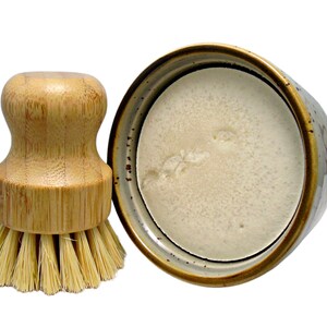 Dish washing brush and solid soap in ceramic ramekin