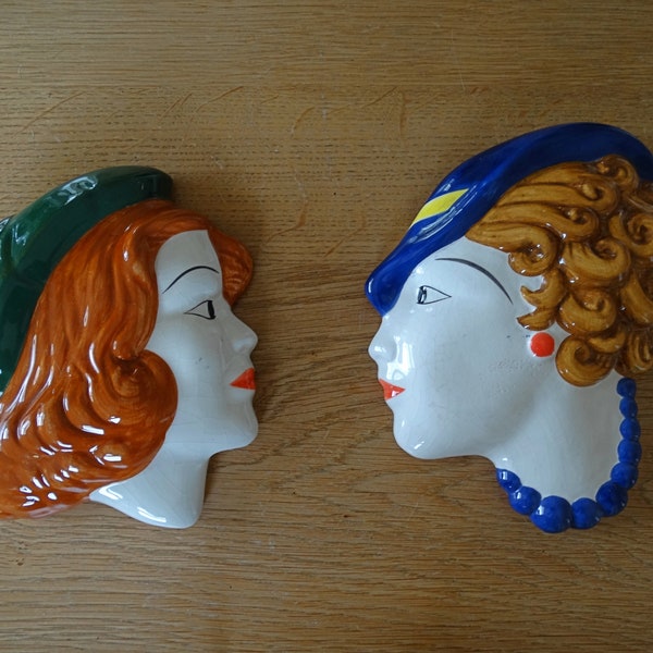 Set of two ladies wall masks from the fifties