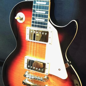 Iconic Classic Style Guitar/Looks & Sounds Great/Case/Cord/Strap/Free Shipping
