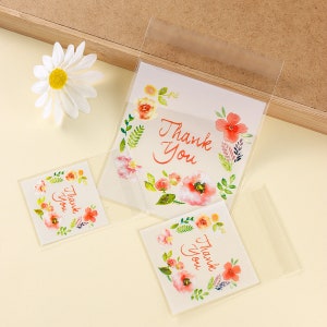 100個入り粘着クリアバッグ、ピンクの花がプリントされた「Thank You」プラスチックバッグ、かわいい包装バッグ、クッキーバッグ、セルフシールギフトバッグ