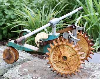 Vintage Sears Roebuck Traveling Cast Iron Tractor Sprinkler