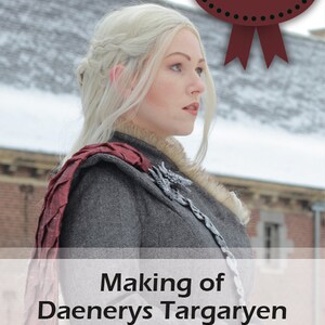 May include: A woman in a grey and fur costume with a red scarf and a silver dragon pin. The text "Making of Daenerys Targaryen" is on a white banner in front of her. The text "By Pretzel Cosplay" is at the bottom of the image. The image has a red circle with white dots and the text "E-Book" in white.