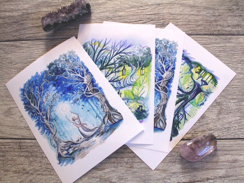 May include: Four watercolor paintings on white paper, each depicting a whimsical forest scene with trees, foliage, and a moon. The paintings are arranged in a fan shape, with the top painting showing a figure reaching up to the moon.