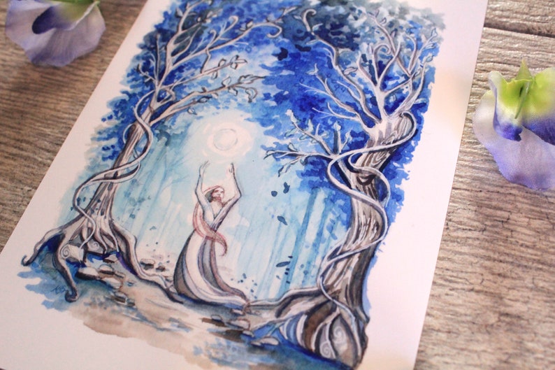 May include: A watercolor painting of a woman standing in a blue forest with her arms raised towards a glowing moon. The trees are entwined with vines and have a whimsical feel.