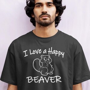 May include: Black t-shirt with the text "I Love a Happy BEAVER" in white. The shirt features a cartoon beaver illustration. The t-shirt is a casual wear item.
