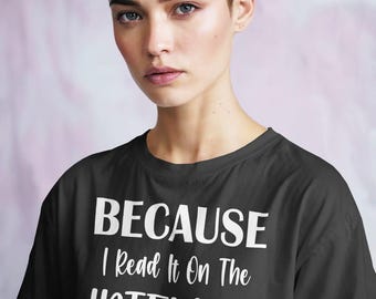May include: Black t-shirt with the white text "BECAUSE I Read It On The INTERNET". The shirt is a crew neck style and is being worn by a person with short hair.