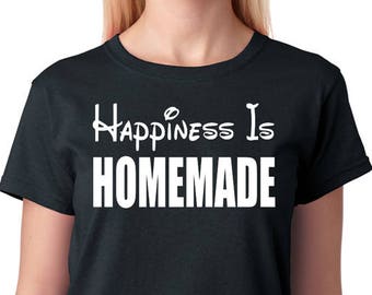 May include: Black t-shirt with white text that reads "Happiness Is Homemade".
