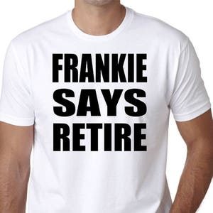 May include: White t-shirt with black text that reads "Frankie Says Retire".