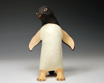 Ceramic penguin sculpture