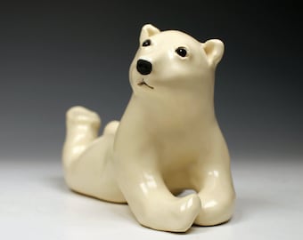 Ceramic polar bear, creamy white, satin crackle glazed, realistic ceramic polar bear sculpture
