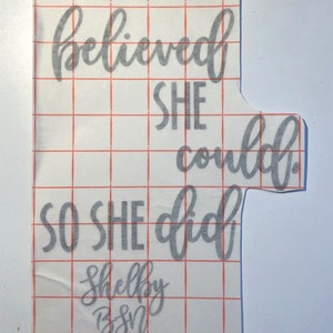 May include: A gray vinyl decal with the text "She believed she could, so she did" and the name "Shelby BSM 2020".