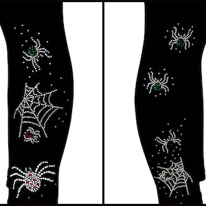 Peut inclure: Legging noirs orn&eacute;s d'une toile d'araign&eacute;e et d'araign&eacute;es scintillantes. Les araign&eacute;es et la toile sont faites de strass blancs, rouges et verts. Un v&ecirc;tement sur le th&egrave;me d'Halloween.