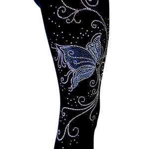 May include: Black leggings with a blue butterfly and silver rhinestone embellishments in a floral design.