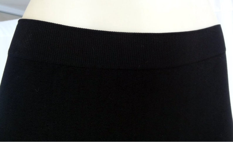 May include: Black seamless leggings with a ribbed waistband.