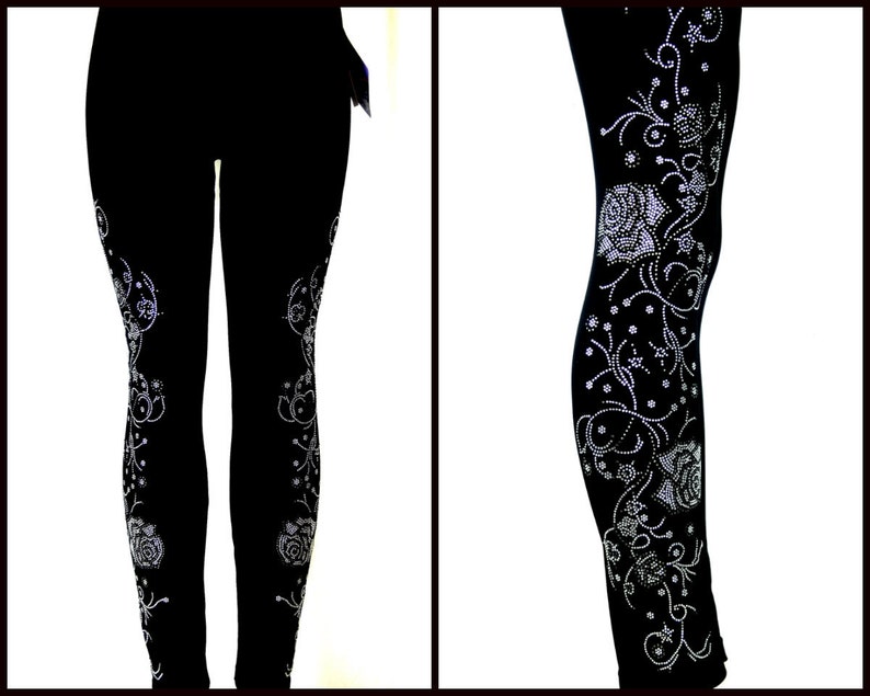May include: Black leggings with a silver rhinestone floral design.