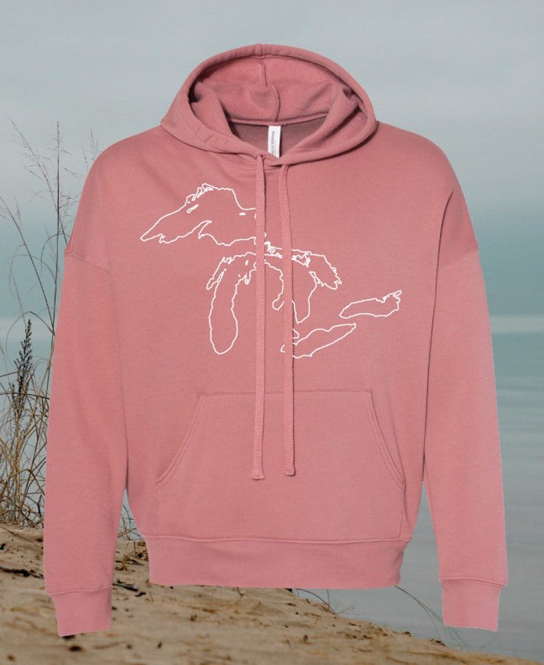 May include: A dusty rose colored hoodie with a white outline of the Great Lakes on the front.