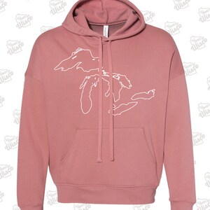May include: A dusty rose colored hooded sweatshirt with a white outline of the Great Lakes on the front.