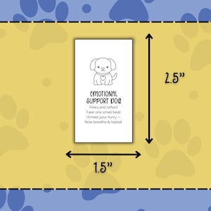 May include: A rectangular card, 2.5 inches tall and 1.5 inches wide, with a yellow background and blue paw prints. The card features a black and white illustration of a dog and the text "EMOTIONAL SUPPORT DOG".