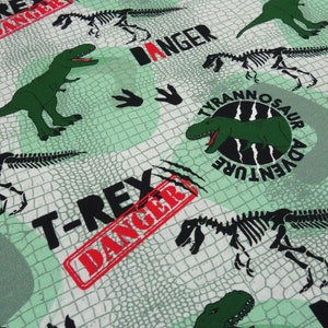 Fabric cotton French Terry sweatshirt fabric with dino dinosaur design green grey black dress fabric children's fabric