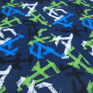 Fabric cotton jersey with graphic geometric pattern blue green black white children's fabric dress fabric