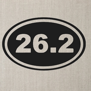 May include: Black oval sticker with white text that reads "26.2".