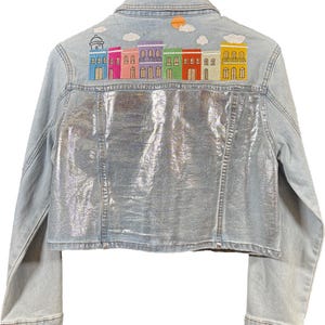 May include: A set of three ceramic mugs with a speckled, matte finish. The mugs are in shades of cream, light gray, and dark gray. Each mug has a simple, minimalist design, perfect for coffee or tea.