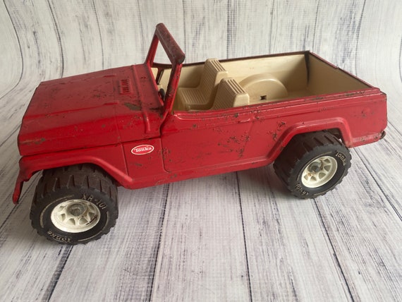 Vintage Red Tonka Jeep Jeepster Circa 