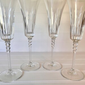 Mikasa Spectrum Nine Inch Fluted Champagne Glasses Set of Four Blown Glass 1987 til 1990, Features Vertical Cuts on a Fluted Bowl, Unused