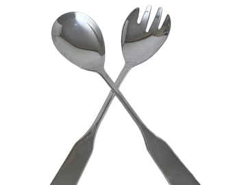 May include: A silver salad serving set with a spoon and a fork.