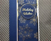 Handmade Christmas card with embossed snowflakes