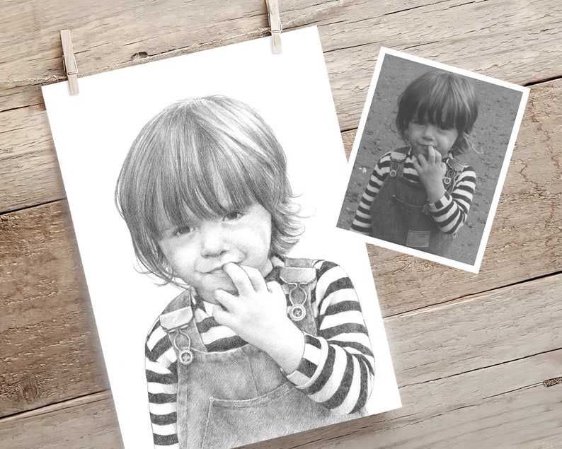 May include: A black and white pencil drawing of a young child with short, choppy hair wearing a striped shirt and overalls. The child is biting their finger.