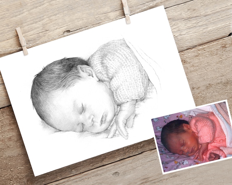May include: A black and white pencil drawing of a sleeping baby wearing a knitted sweater.