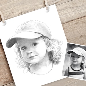 May include: A black and white pencil drawing of a child wearing a baseball cap. The child has long, wavy hair and is looking to the side.