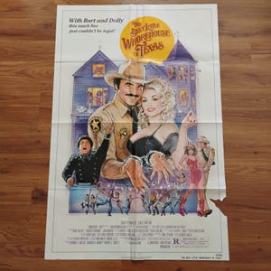 May include: A rustic wooden sign with the text "Welcome to our home" in white lettering. The sign features a distressed finish and a simple, inviting design, perfect for front door decor.