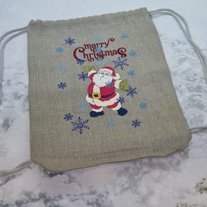 Linen Backpack: Embroidered Santa Drawstring Bag