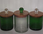 An absolutely stunning set of vintage storage jars from the 1950 39 s, each with a customized 2 part oak lid and matching glass knobs.