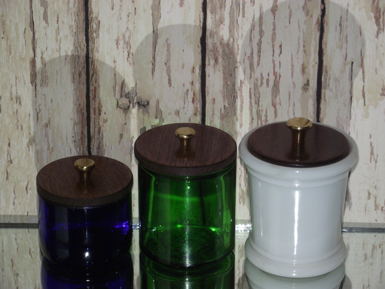 An Unusual Trio Of Colorful Glass Storage Containers Dresser Jars With Customized 2 Part Black Walnut Lids And Solid Brass Knobs