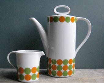 A vintage German coffee pot and milk jug