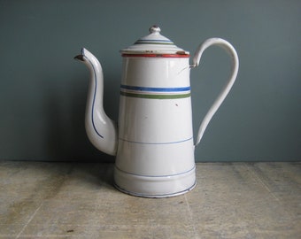 A vintage French chippy enamel coffee pot